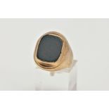 A 9CT BLOODSTONE SIGNET RING, a rectangular bloodstone inlayed into an oval yellow gold collet