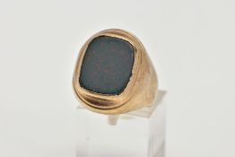 A 9CT BLOODSTONE SIGNET RING, a rectangular bloodstone inlayed into an oval yellow gold collet