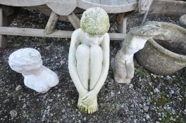 FIVE COMPOSITE GARDEN FIGURES OF LADIES, including a resin figure of a naked female with her knees