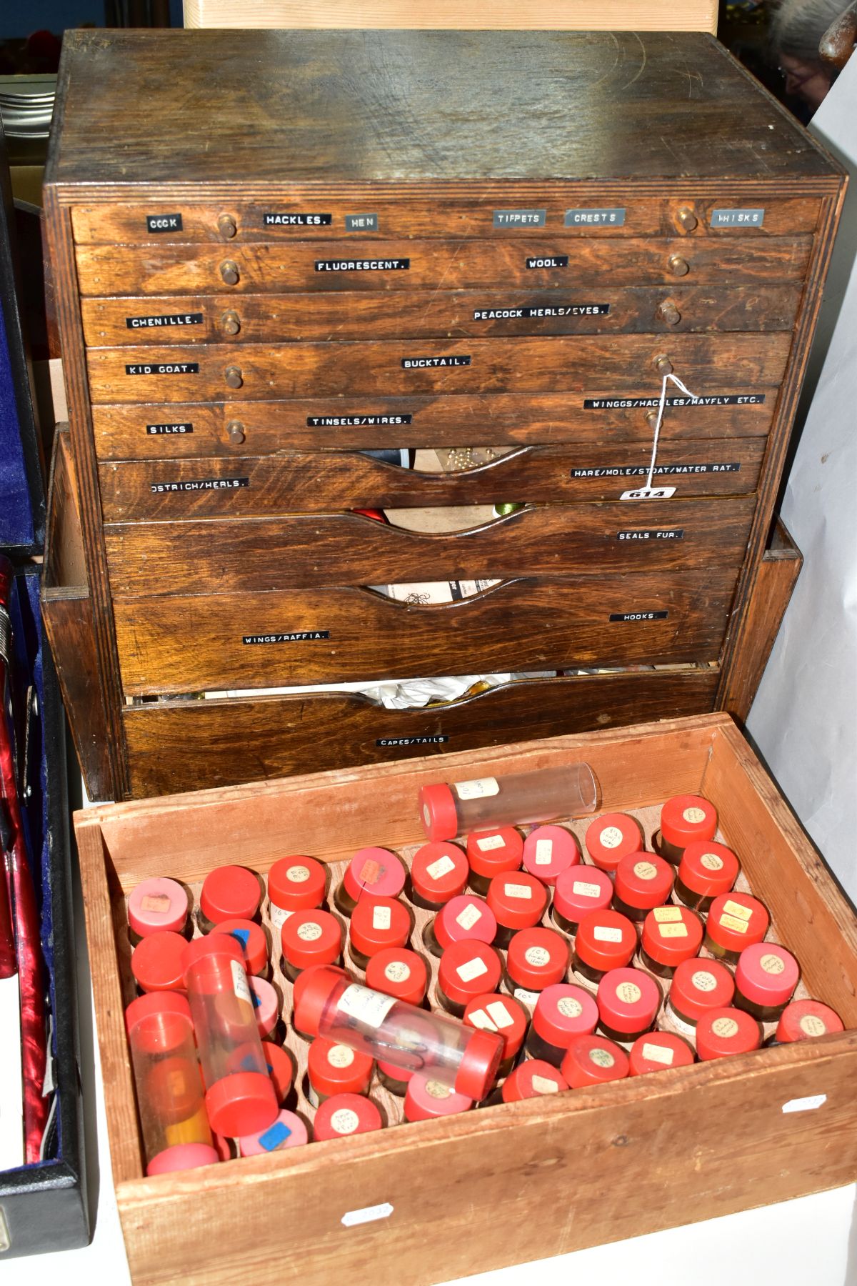 FLY TYING INTEREST, a nine drawer chest containing fly tying accessories, including feathers,