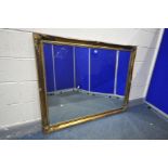 A LARGE GILT WALL MIRROR with foliate decoration, length 136cm x height 107cm