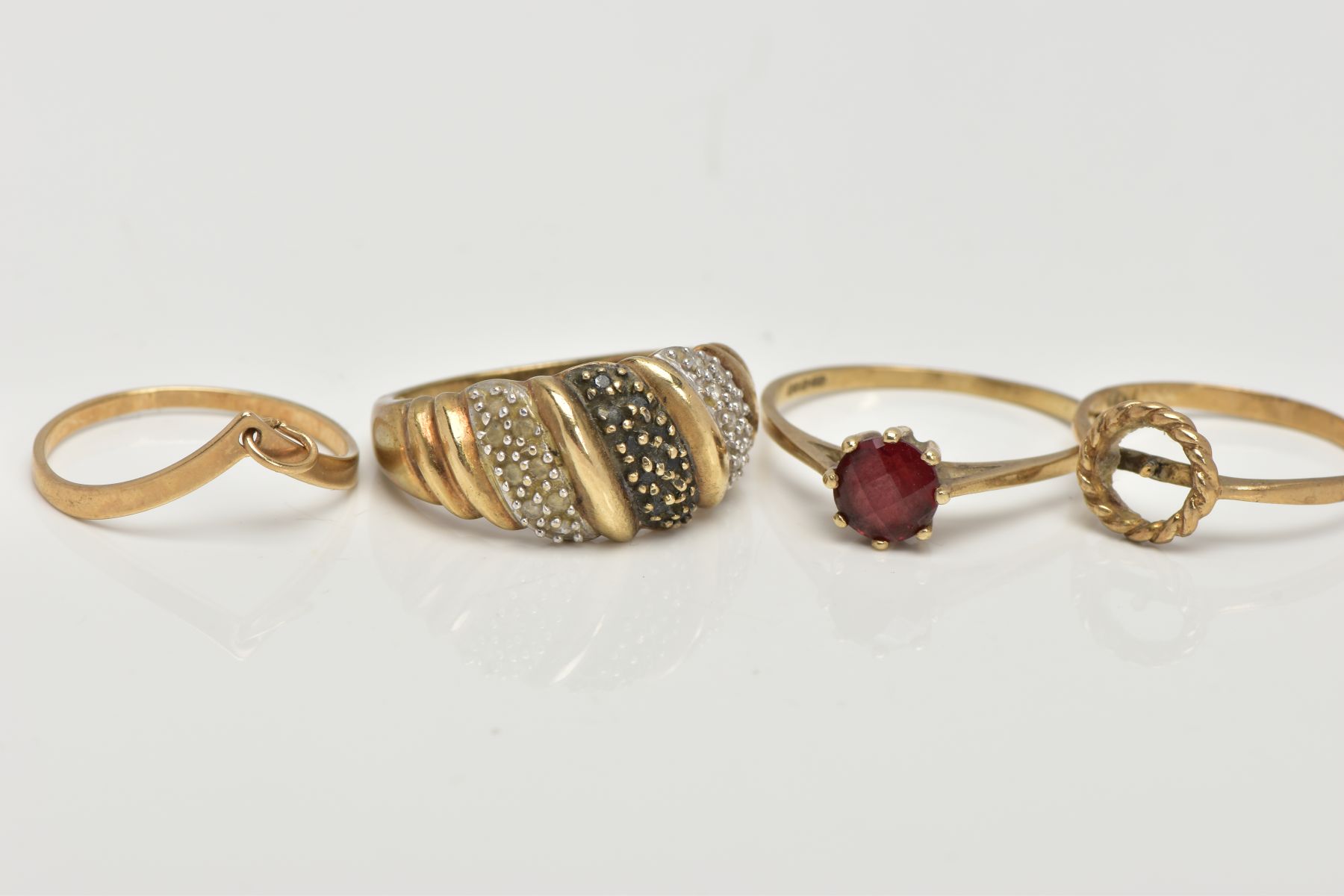 THREE 9CT GOLD RINGS AND ONE OTHER, to include a single cut diamond detailed ring, tapered shoulders - Image 2 of 3