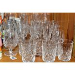 TWENTY SIX WATERFORD CRYSTAL LISMORE PATTERN GLASSES, comprising a set of six flutes, six wine