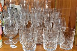 TWENTY SIX WATERFORD CRYSTAL LISMORE PATTERN GLASSES, comprising a set of six flutes, six wine