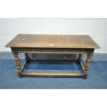 A TITCHMARSH AND GOODWIN STYLE COFFEE TABLE, on turned legs united by stretchers, length 92cm x