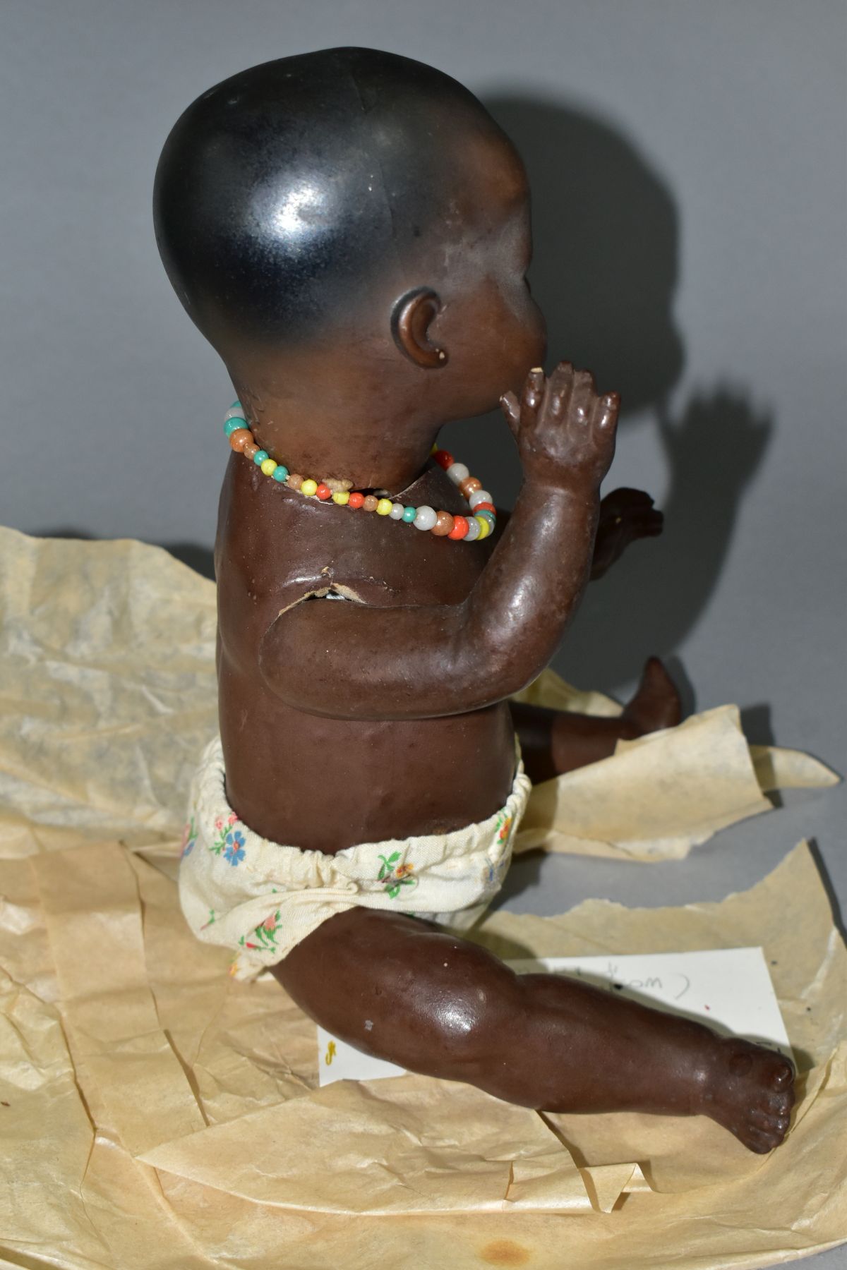 A GERMAN KB-M 1 BLACK BISQUE HEAD DOLL, composite body and bent limbs, sleeping eyes, pierced - Image 5 of 7