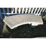 A MODERN COMPOSITE CURVED GARDEN BENCH, with a pair of tapered bases of South American design,