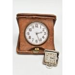 A SILVER TRAVEL CLOCK AND GOLIATH TRAVEL CLOCK, a small silver cased square travel clock, signed '