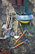 A SELECTION OF GARDEN TOOLS, to include a lawn seeder, garden kneeler with handles, brushes, shovel,