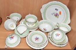 A TWENTY ONE PIECE PARAGON POLKA TEA SET, handpainted and transfer printed decoration, comprising