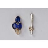 TWO PENDANTS, the first a drop pendant set with three oval cut blue stones assessed as kyanite,