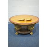 A FRENCH GILTWOOD AND HARDWOOD CIRCULAR COFFEE TABLE, the top supported on four swans, to a circular