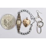 A COMMEMORATIVE COIN, LOCKET, WATCH AND EARRING, to include a 1916 battle of Jutland, German fleet