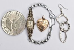 A COMMEMORATIVE COIN, LOCKET, WATCH AND EARRING, to include a 1916 battle of Jutland, German fleet