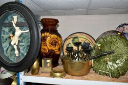 A GROUP OF CERAMICS, GLASS AND METAL WARES, to include a crucifix in a black oval glazed frame on
