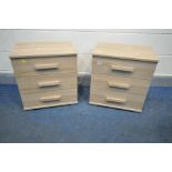 A PAIR OF OAK EFFECT THREE DRAWER BEDSIDE CABINETS, width 50cm x depth 37cm x height 54cm (