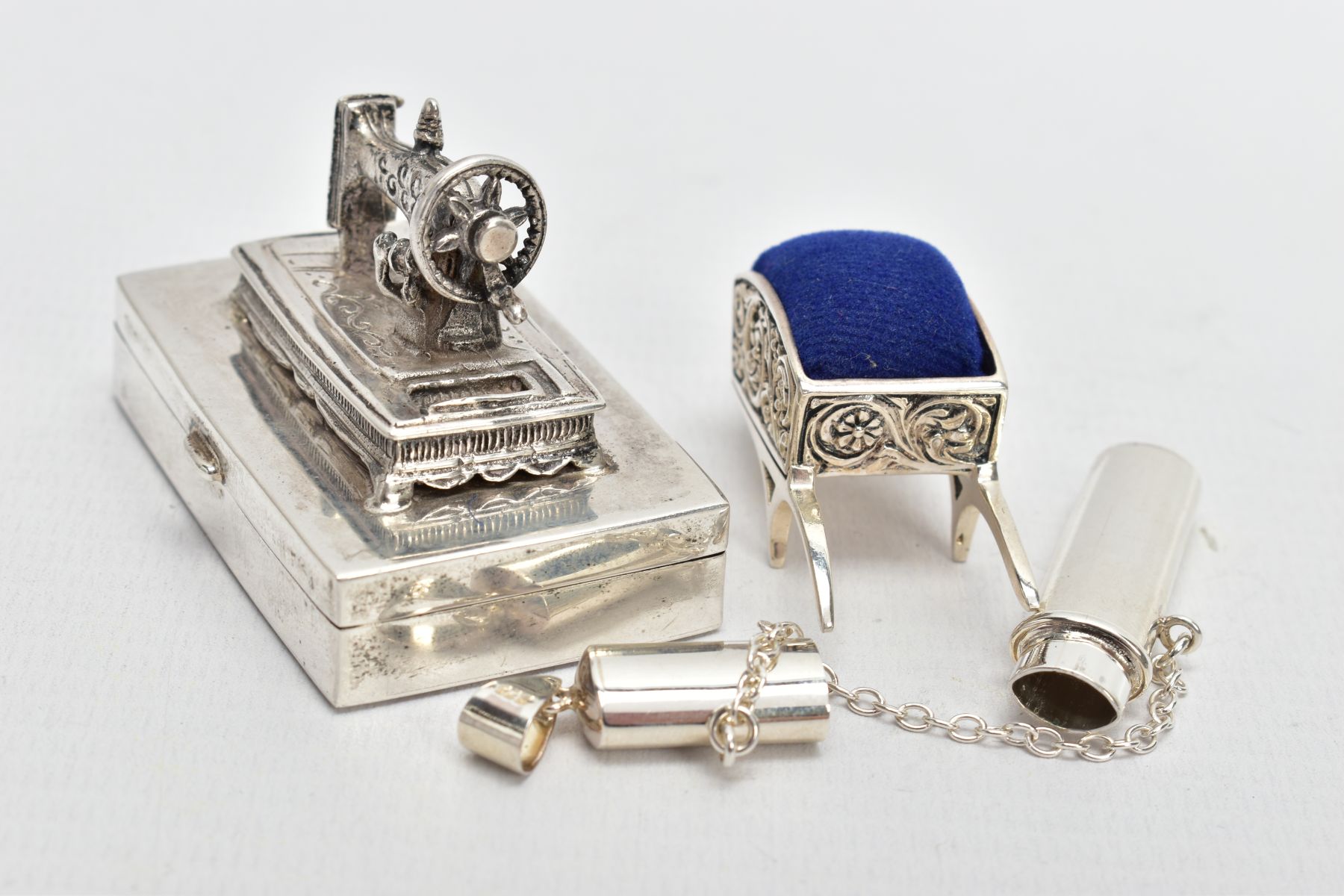 THREE WHITE METAL ITEMS, to include a silver sewing needle box fitted with a sewing machine to the - Image 4 of 5
