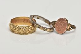 A 9CT GOLD BAND RING AND TWO OTHER RINGS, a wide yellow gold diamond cut pattern band, approximate