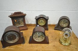 SIX VARIOUS CLOCKS, of various styles, materials and ages, to include three domed mantel clocks, two