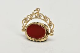 A 9CT GOLD SWIVEL FOB, set with oval cut onyx, carnelian and bloodstone panels, openwork scroll