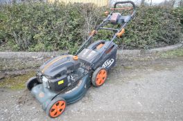 A BMC LAWNRACER 20ESi SELF PROPELLED PETROL LAWN MOWER with a Wolf engine, electric start, auto