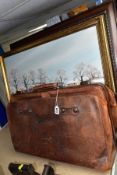 AN EARLY 20TH CENTURY BROWN LEATHER BAG, EMBOSSED INITIALS W.E.B., the interior with checked