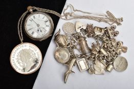 A SILVER CHARM BRACELET, SILVER MOUNTED COIN AND SILVER POCKET WATCH, a heart padlock double curb