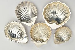 FIVE SILVER SHELL DISHES, each raised on three ball feet, with full silver hallmarks for Chester,