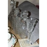 SEVEN 20TH CENTURY GLASS DECANTERS TOGETHER WITH A ROYAL DOULTON CRYSTAL GOBLET, decanter shapes