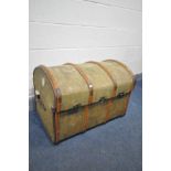 A VINTAGE CANVAS AND WOODEN BOUND DOME TOP TRUNK, with twin leather handles, width 80cm x depth 53cm