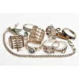 A BAG OF WHITE METAL RINGS, PENDANTS AND A BRACELET, eight white metal rings of various designs