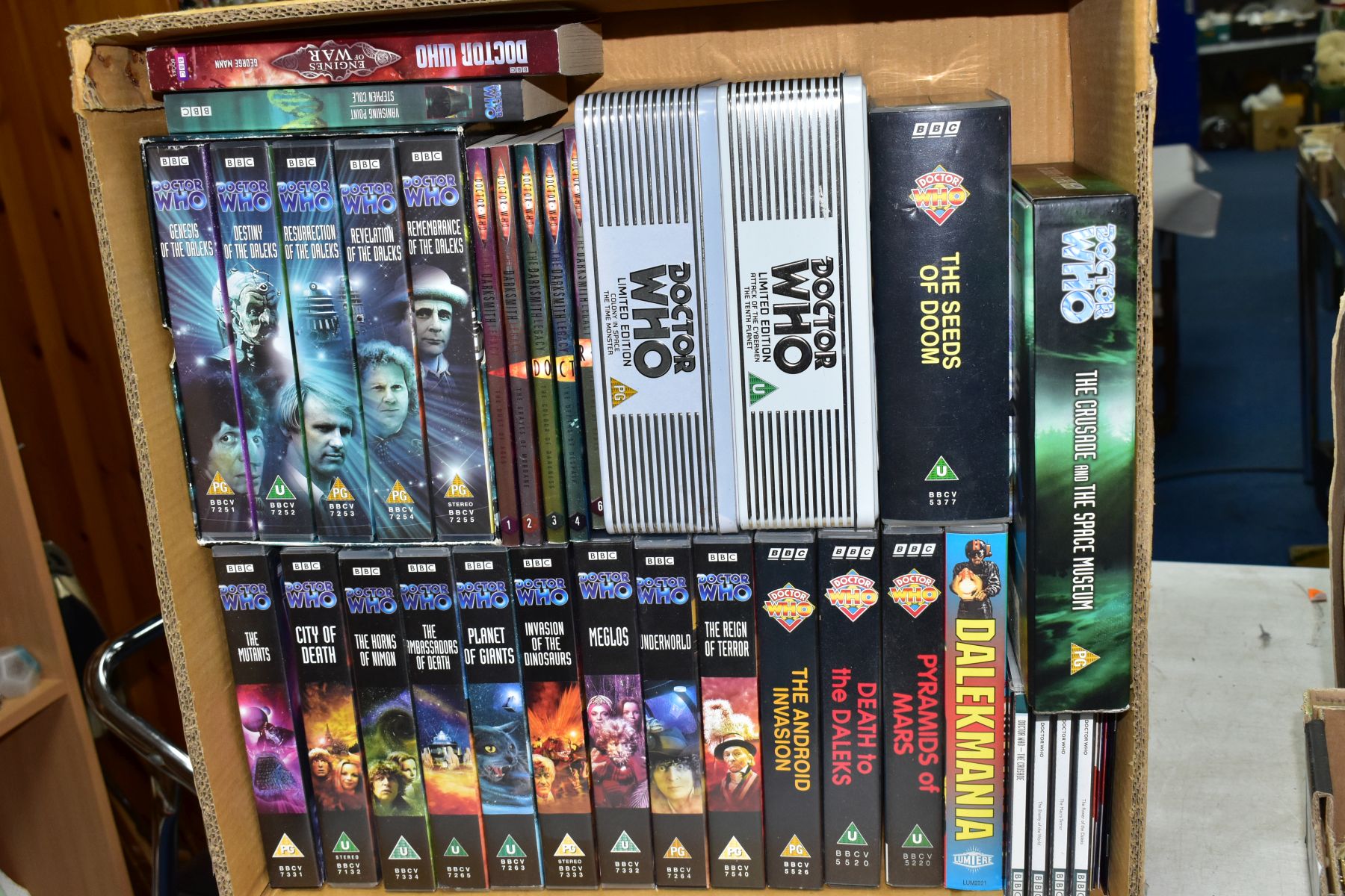 A BOX OF DOCTOR WHO BOOKS, CDS AND VHS CASSETTES, ETC, including five The Darksmith Legacy books,
