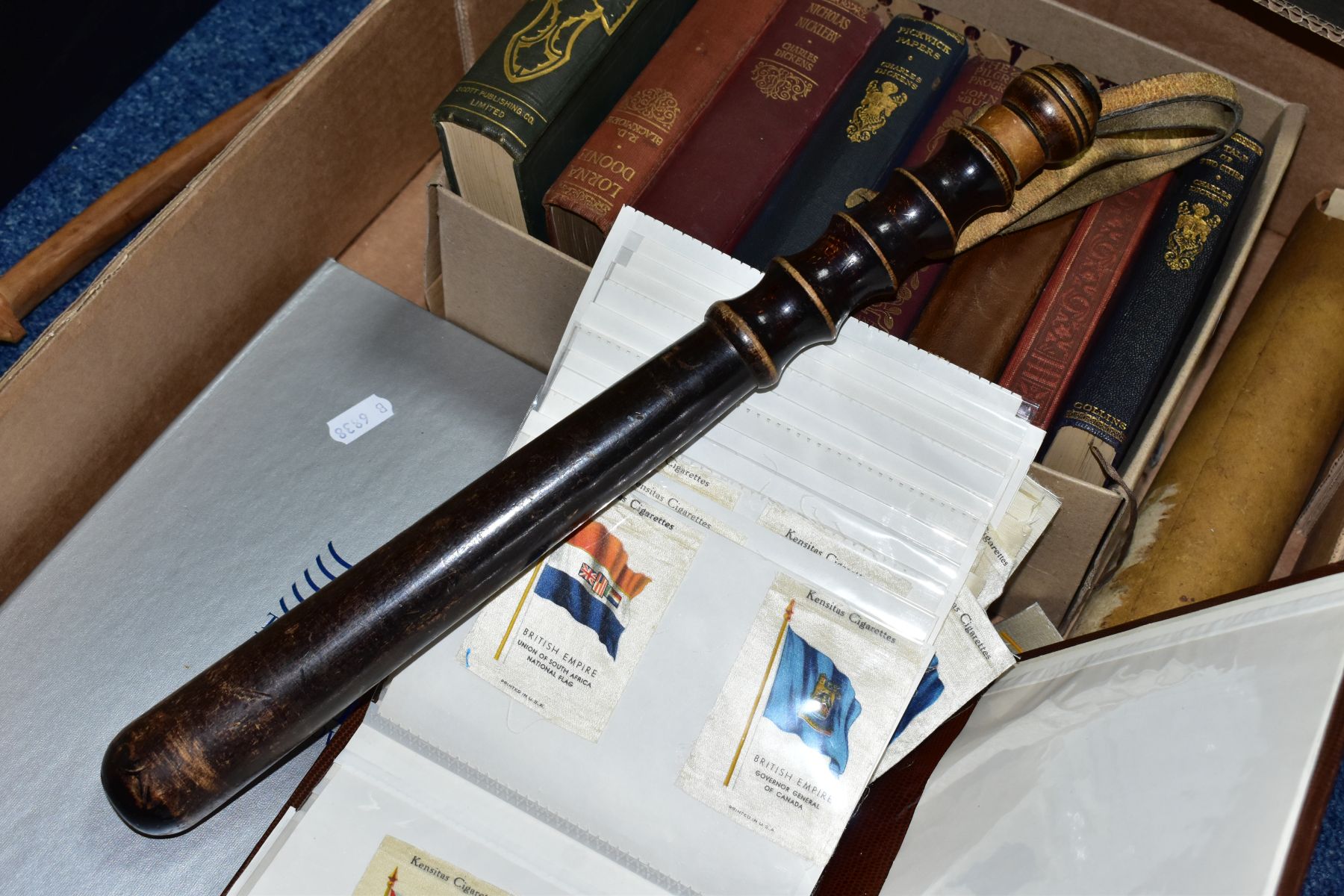 A BOX OF CHARLES DICKENS AND OTHER BOOKS, A TURNED WOODEN TRUNCHEONS, THREE ROLLED ORDER OF - Image 6 of 9