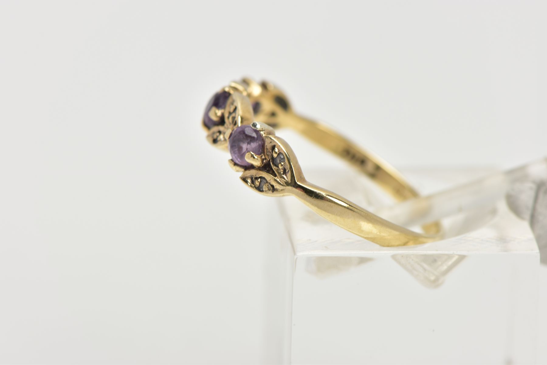 A 9CT GOLD AMETHYST AND DIAMOND RING, half eternity style ring, set with three circular cut - Image 2 of 4