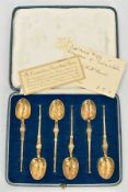 A CASED SET OF SIX SILVER GILT MINIATURE REPLICAS OF THE CORONATION ANOINTING SPOON, cast and chased
