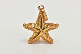 A YELLOW METAL STARFISH PENDANT, a textured yellow metal hollow pendant in the form of a starfish,