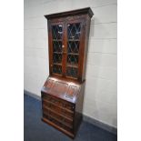 AN OLD CHARM OAK LEAD GLAZED BUREAU BOOKCASE, width 76cm x depth 47cm x height 210cm