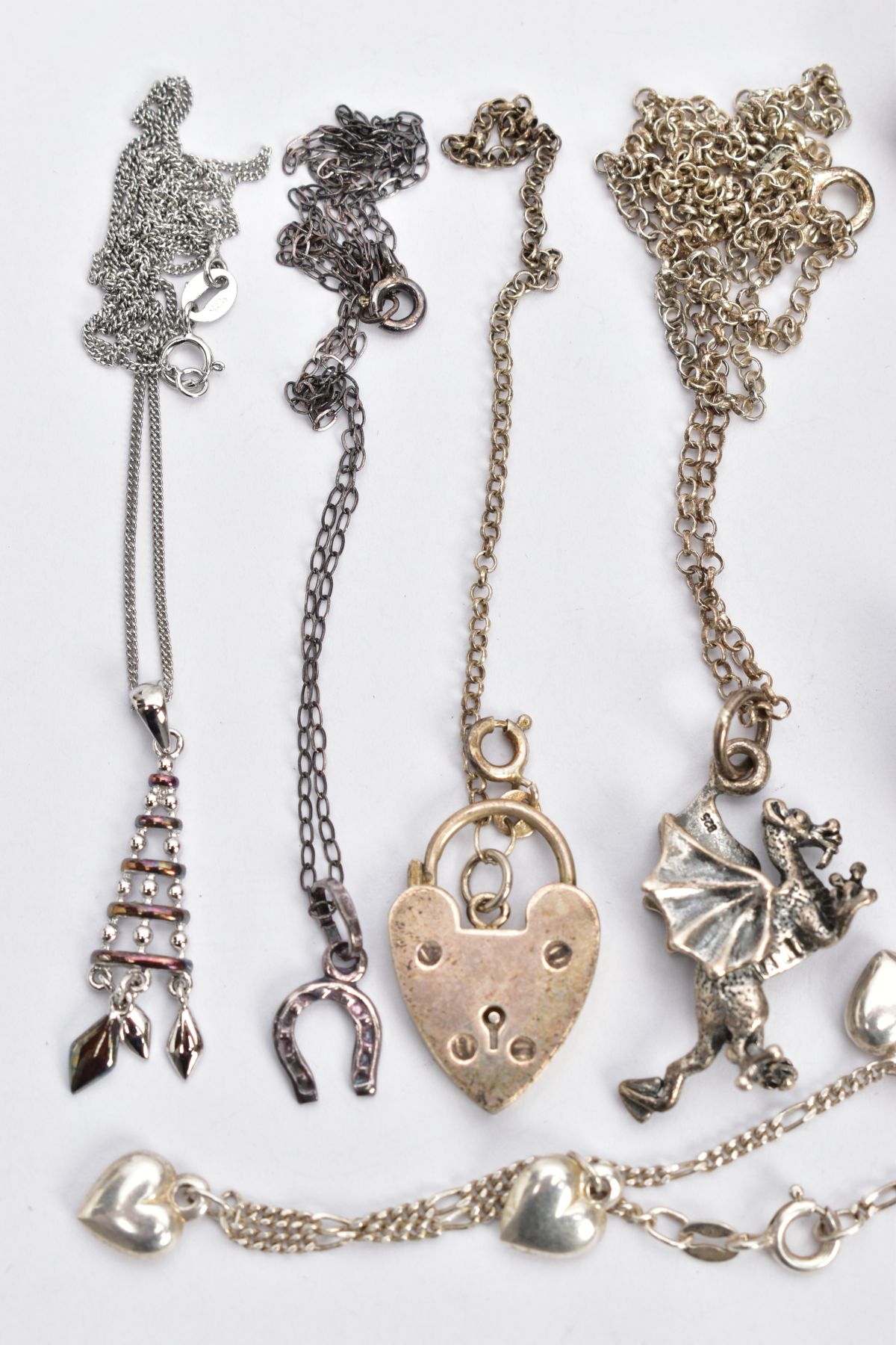 A BAG OF ASSORTED SILVER AND WHITE METAL JEWELLERY, to include a charm bracelet fitted with - Image 2 of 3