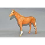 A BESWICK LARGE PALOMINO RACEHORSE, model no 1564, height 28cm, length approximately 36cm (Condition