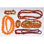 AN ASSORTMENT OF AMBER, COPAL AND BEADED JEWELLERY, to include an unpolished assorted size amber