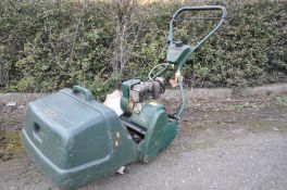 AN ATCO ENSIGN B17 PETROL CYLINDER MOWER with grass box and aerator attachment (engine pulls and