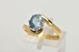 AN 18CT GOLD AQUAMARINE RING, an oval cut aquamarine, approximate dimensions length 8mm x width 6mm,