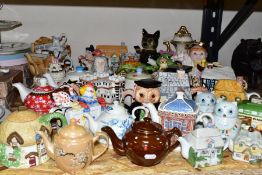 THIRTY SIX NOVELTY AND OTHER TEAPOTS, to include a Cardew Designs washstand teapot, a Portmeirion