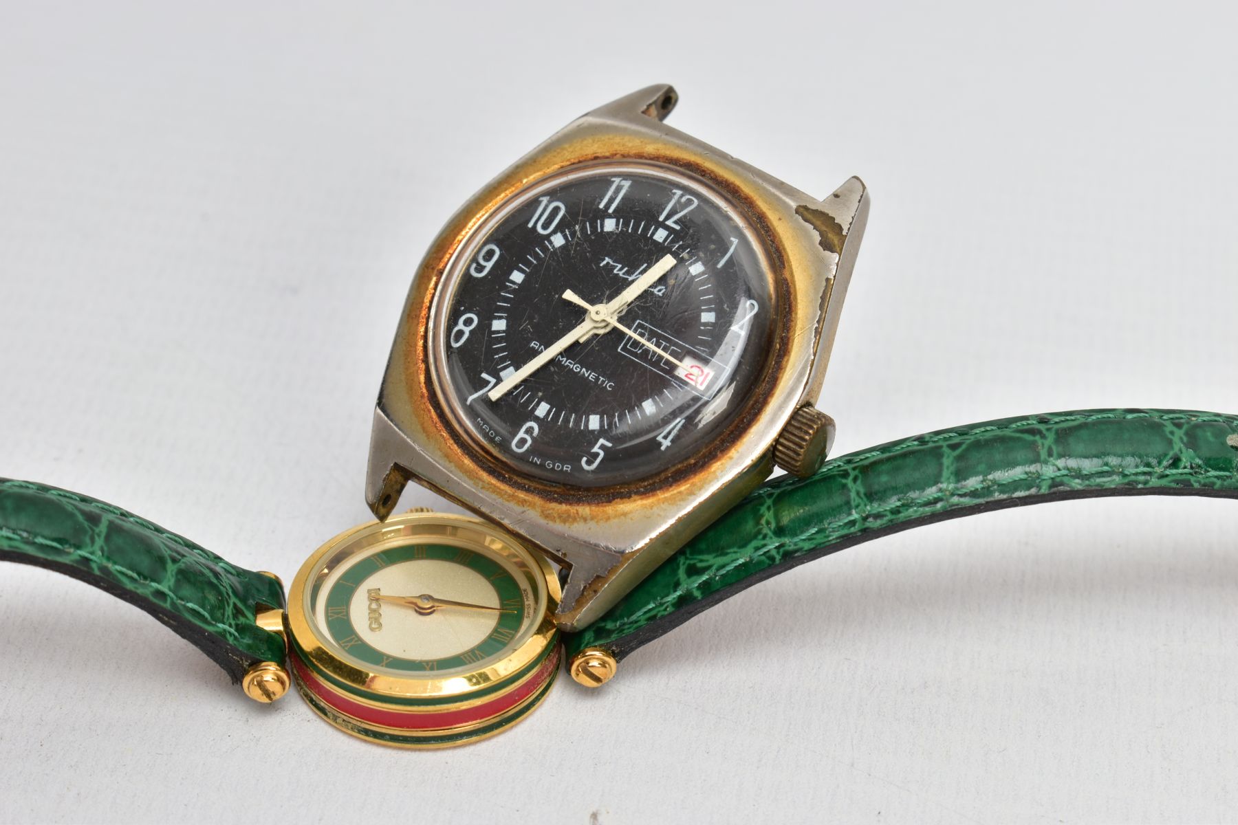 A GUCCI WRISTWATCH WITH ONE OTHER, round shimmer dial with a green border, signed 'Gucci', Roman - Image 2 of 5