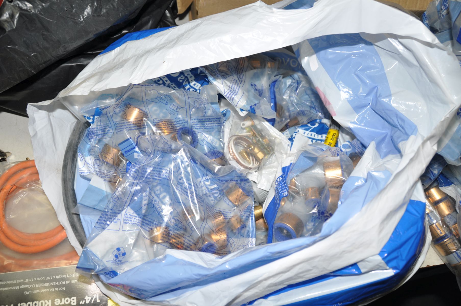 A TRAY, THREE BAGS AND A BUCKET CONTAINING PLUMBING PARTS including Osma Gold push fit fittings, - Image 4 of 8