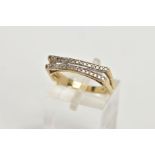 A 9CT GOLD DIAMOND RING, designed with two slightly curved rows of channel set single cut