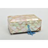 A MOTHER OF PEARL TRINKET BOX, of rectangular form, with hinged lid, pale blue lined interior,