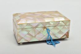 A MOTHER OF PEARL TRINKET BOX, of rectangular form, with hinged lid, pale blue lined interior,