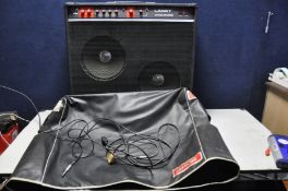 A LANEY VA100 REVERB VALVE COMBO with two 12in McKenzie speakers, a soft cover power cable and