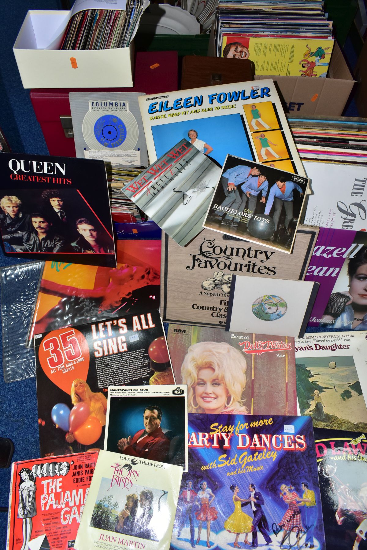 A QUANTITY OF SINGLES RECORDS AND LPS IN FOUR BOXES AND TWO RECORD CASES, artists include The